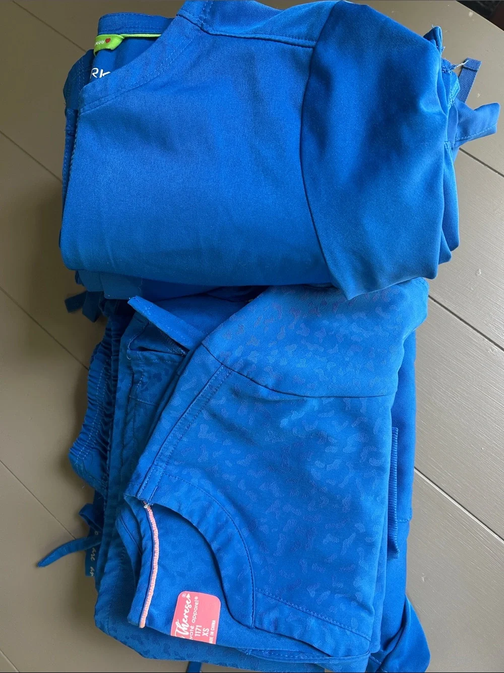 Bundle of royal blue nursing scrubs